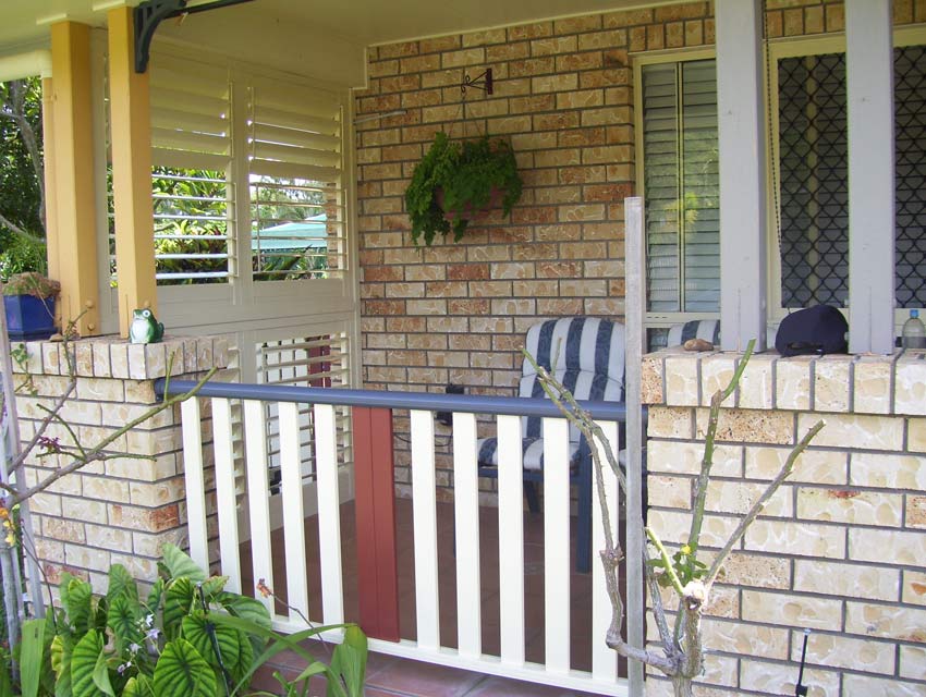 white fence porch