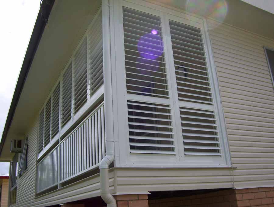 white corner shutters