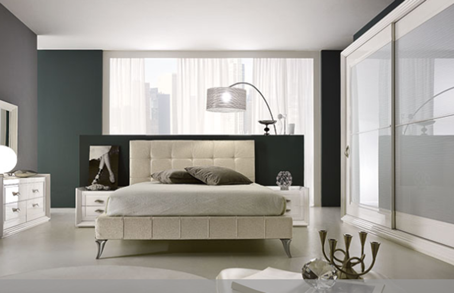 letto con spalliera bianca