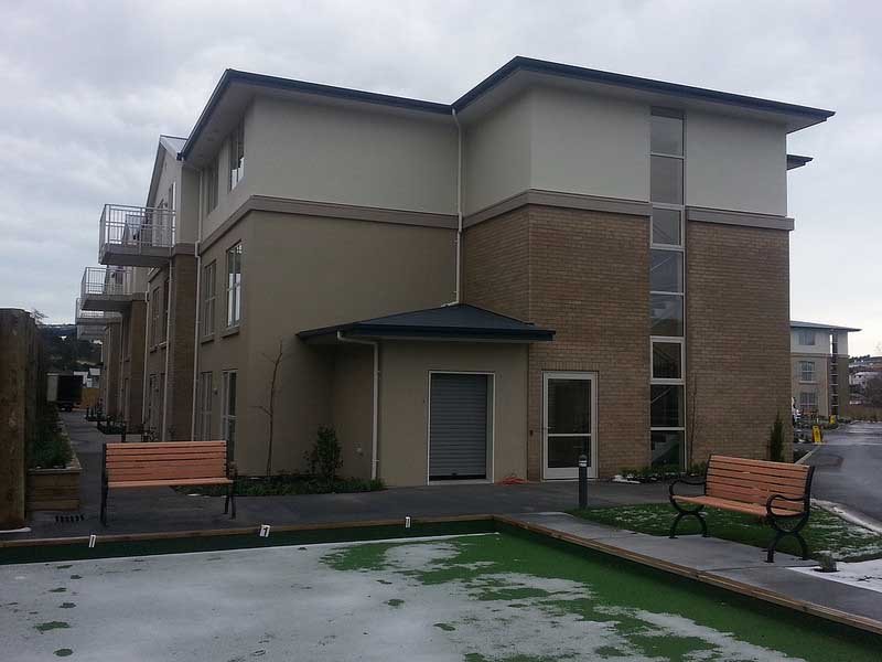 apartment complex with benches