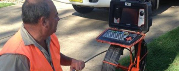 cable and pipe search man using pipe