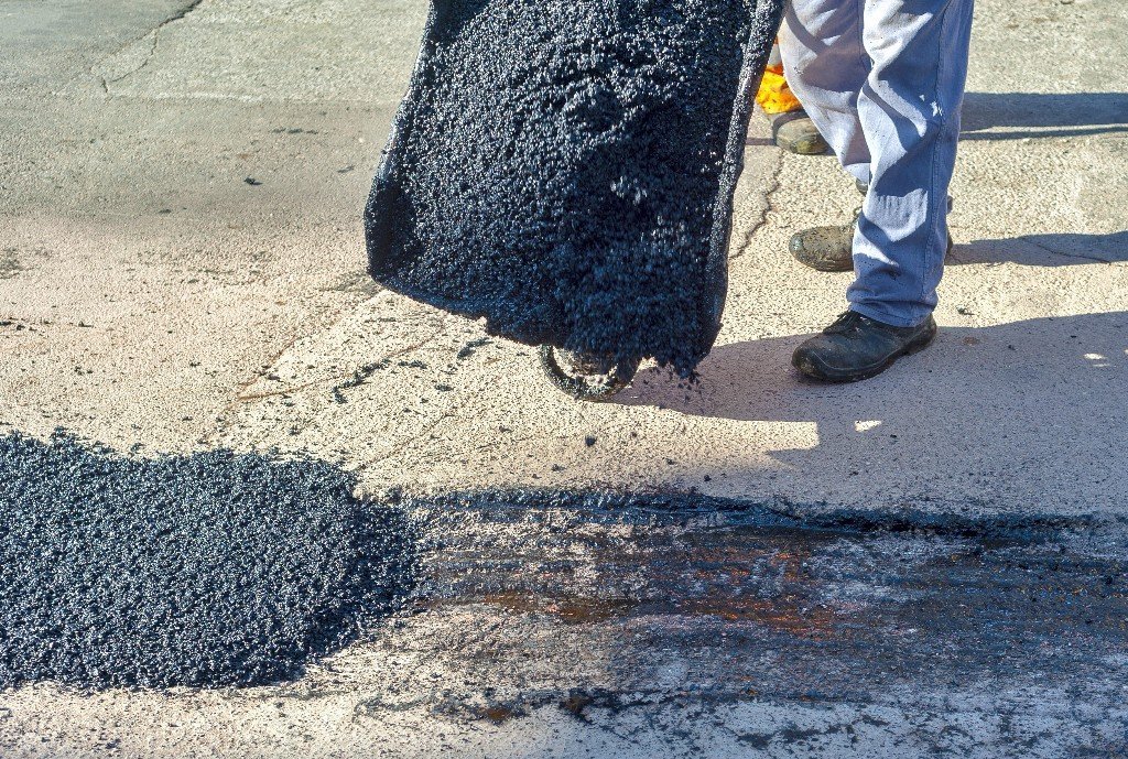 Defects in asphalt driveways causes and repair