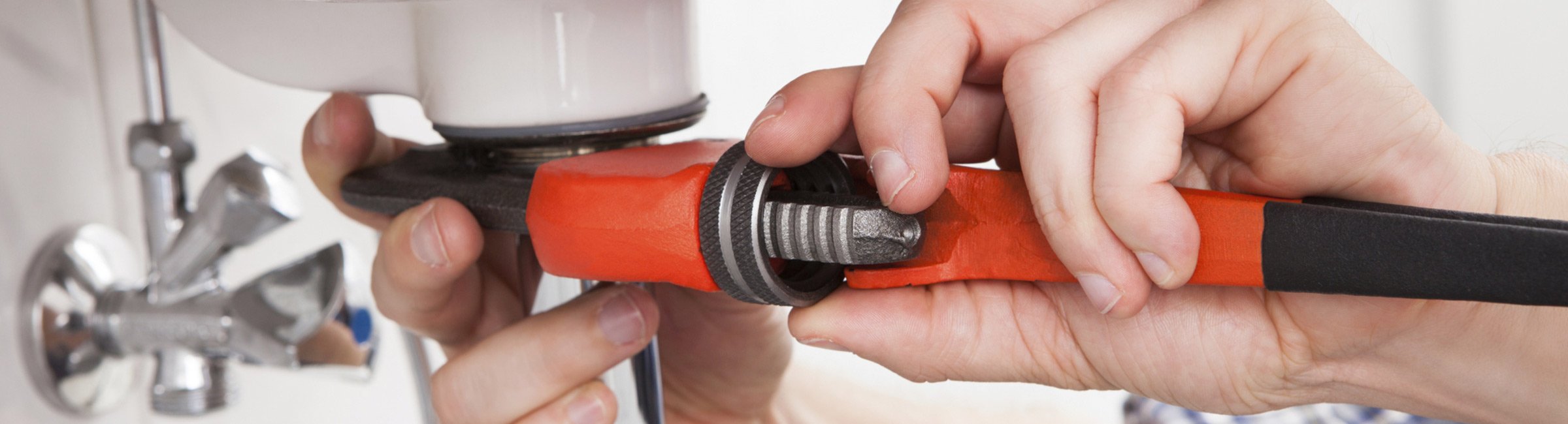 croydon plumbing and hot water plumber fixing a water sink