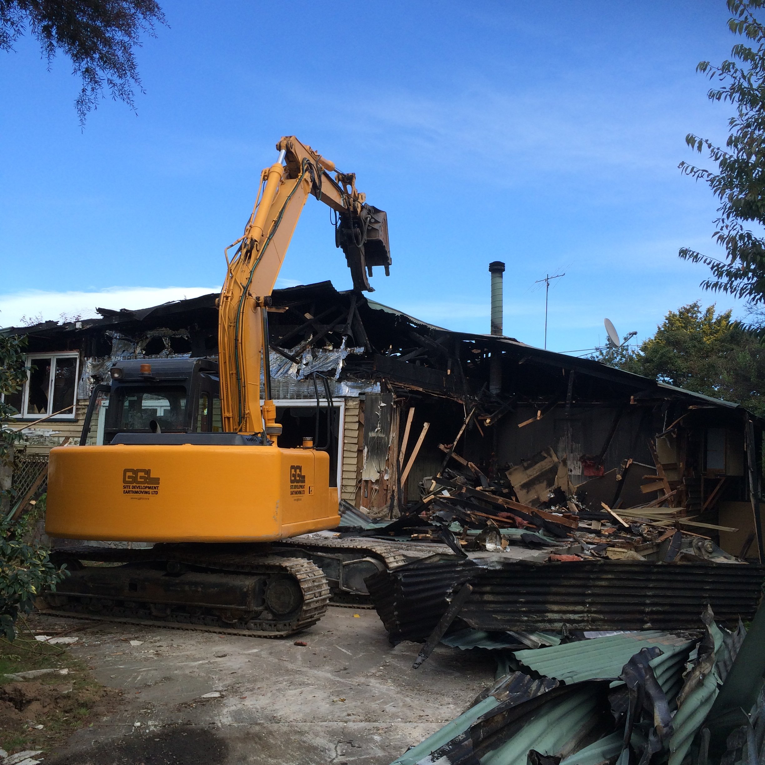 Crane being used for clearing the construction waste from the site