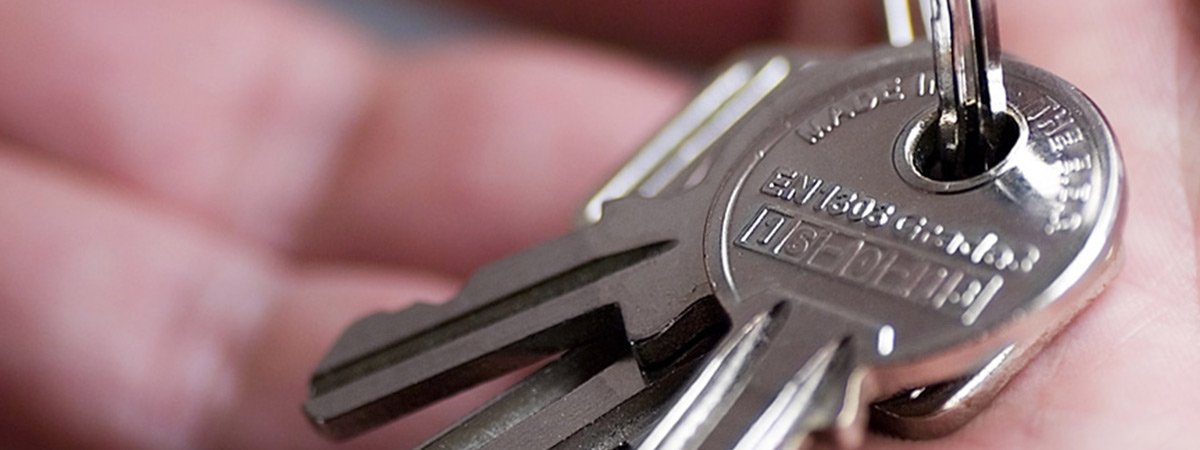 action locksmiths holding keys action locksmiths holding keys