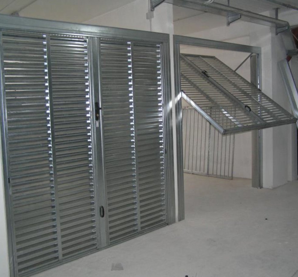 Produzione porte basculanti roma osma Porte basculanti roma