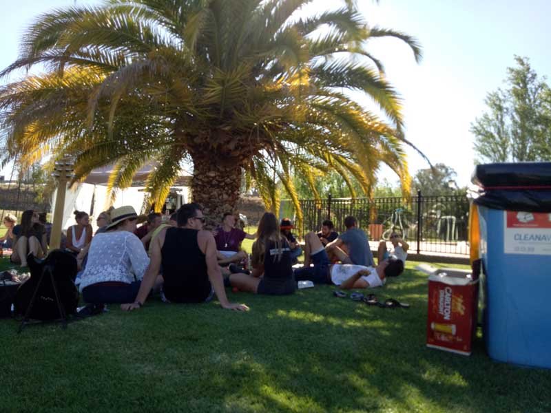 people gathered at caravan park in carlwaa