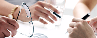 Experts analyzing business statements for taxation services