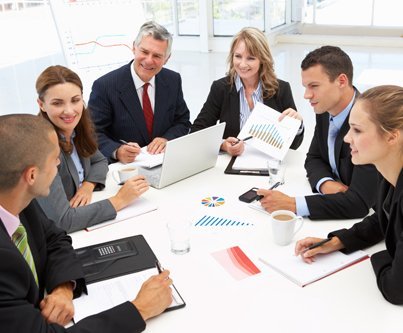 Team of tax experts discussing the financial statements