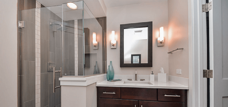 Orange and grey tiled ensuite bathroom