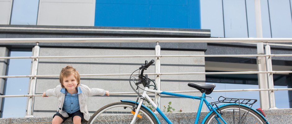 kelmac fencing and gates little boy siting next to fence railing