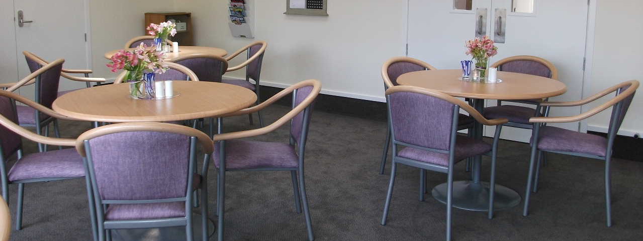 View of round table with chair in a room