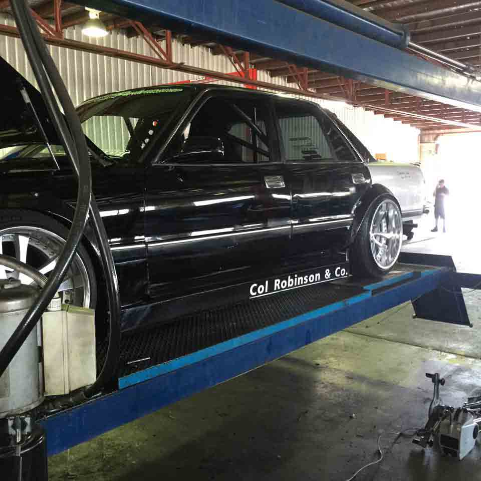 a black car on a lift