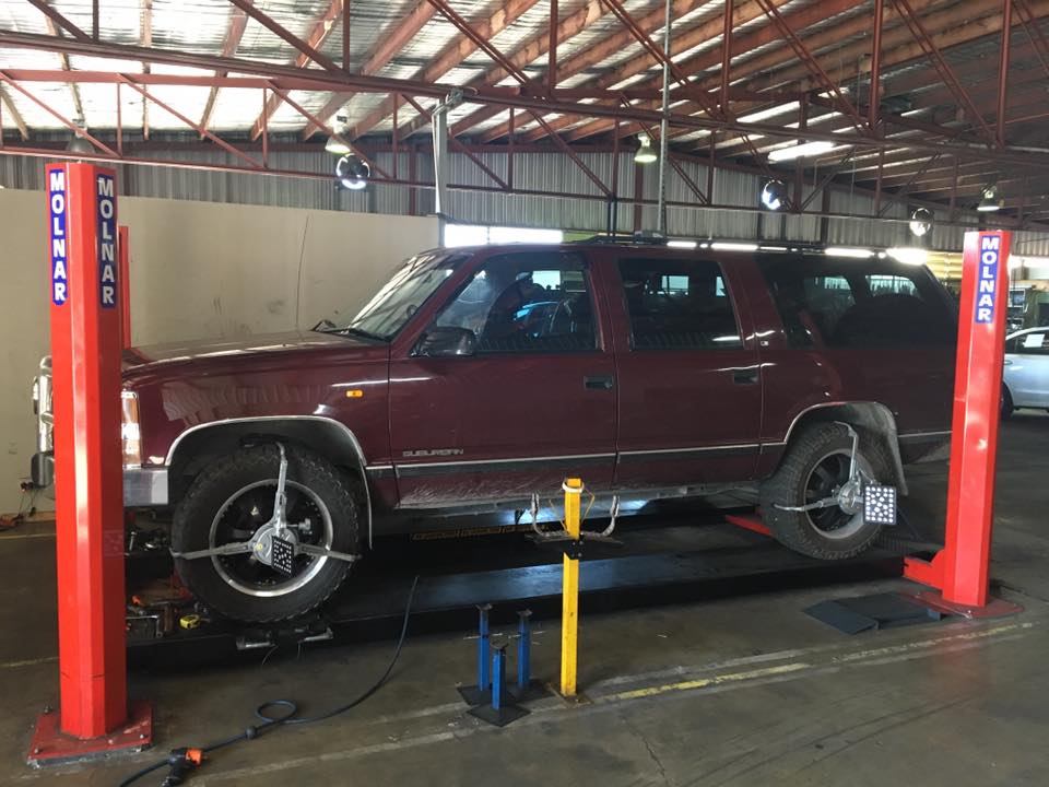 a big maroon vehicle