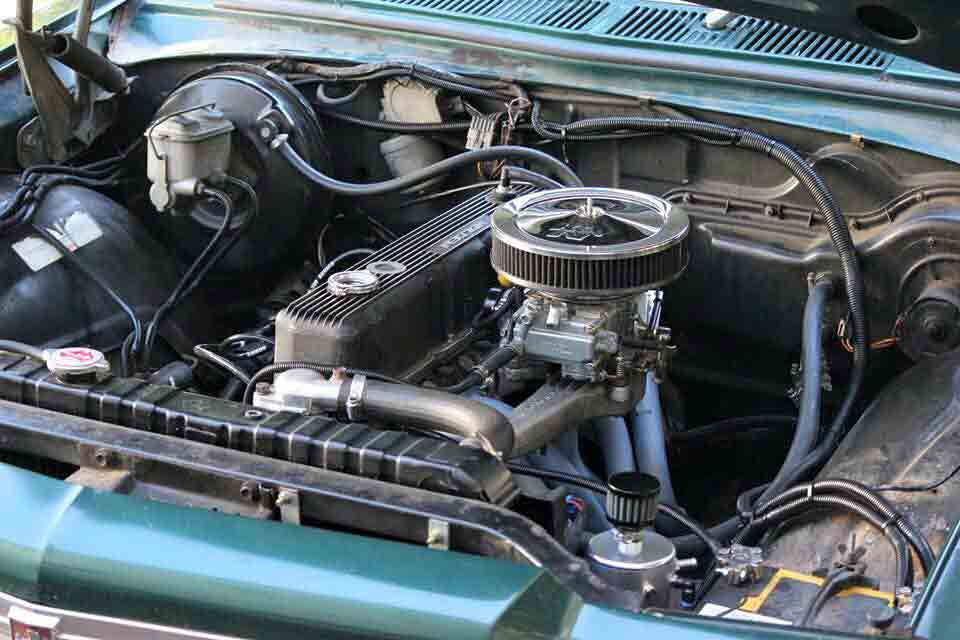 the engine of a blue car