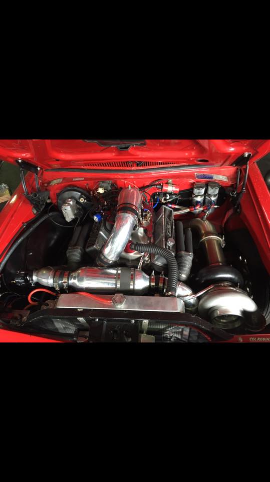 the engine of a red car