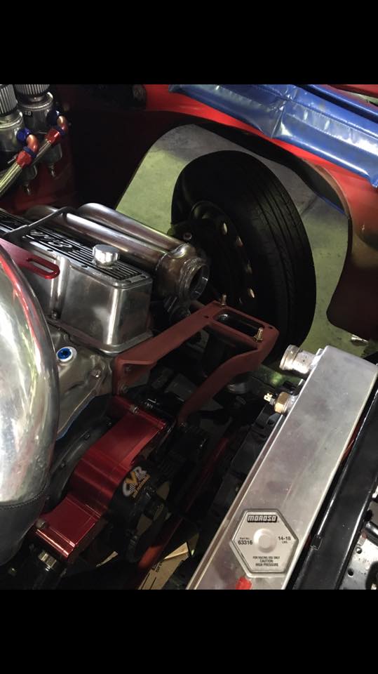 parts of a car under the hood