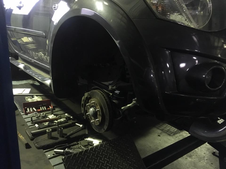 a car with the wheel removed