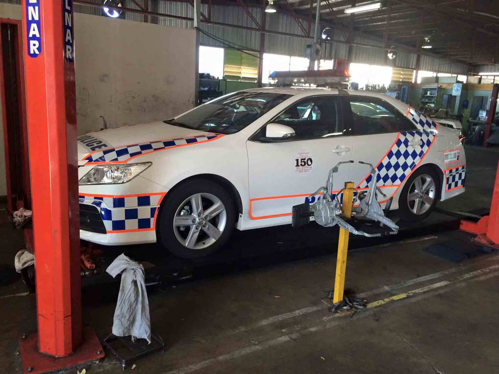 a white car with lots of checkers