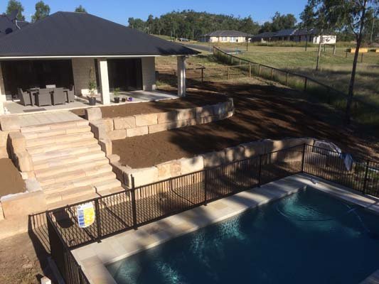 tiered sandstone walls with stairs highfields