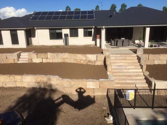 tiered sandstone walls with stairs in highfields