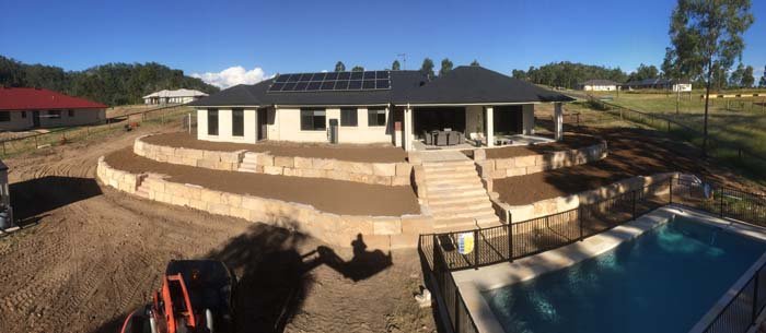 tiered sandstone walls with stairs