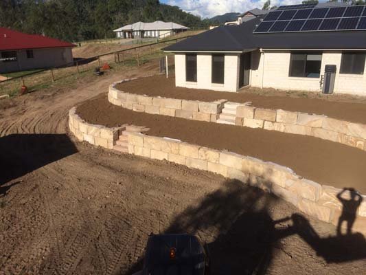 tiered sandstone walls with stairs australia