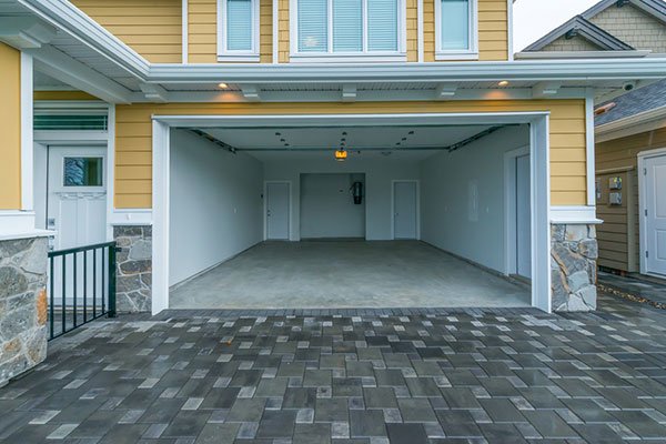 View of residential entry and driveway