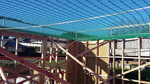 Safety nets from netswork being used at the construction site 