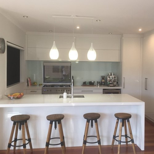 View of a hanging lights in a newly renovated kitchen 