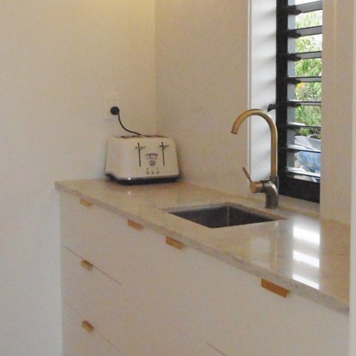 View of a newly built kitchen storage space