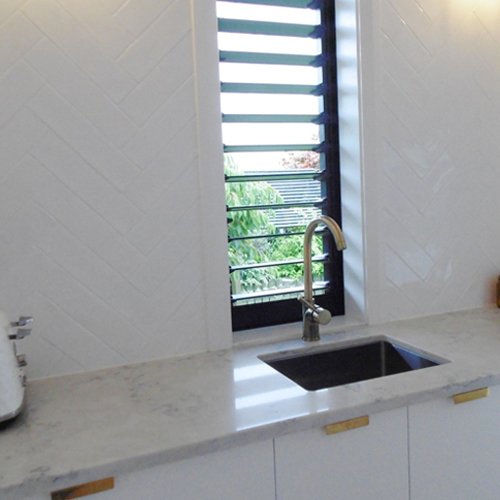 Installed white color kitchen  work top 