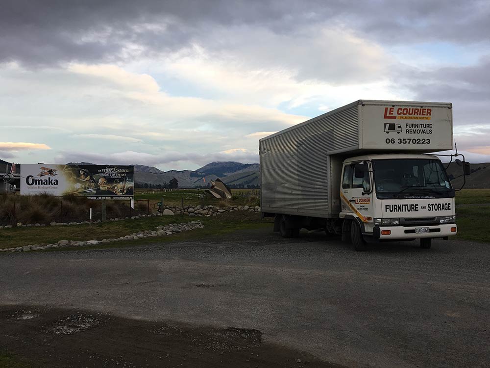 Le Courier truck on road