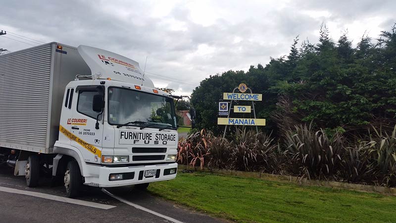 Le Courier truck parking on the road