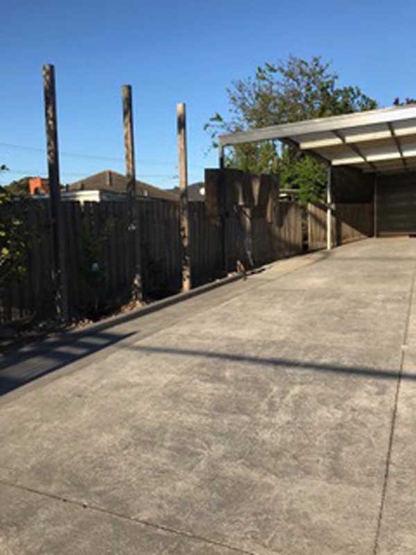 before picture of a driveway that is gray