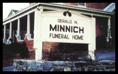 A sign that says gerald n minnich funeral home on it