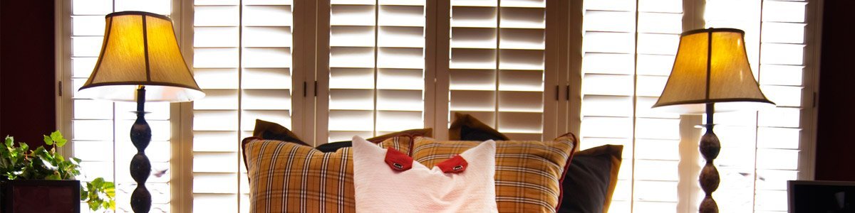 elegant blinds and awnings blinds behind two lamps