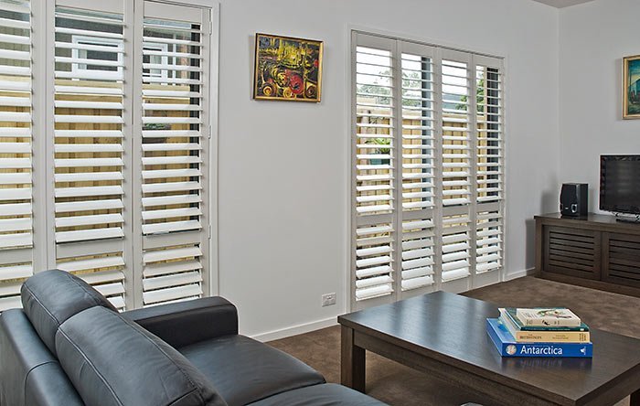 fabrics and things living room grey sofa and white shutters fabrics and things living room grey sofa and white shutters