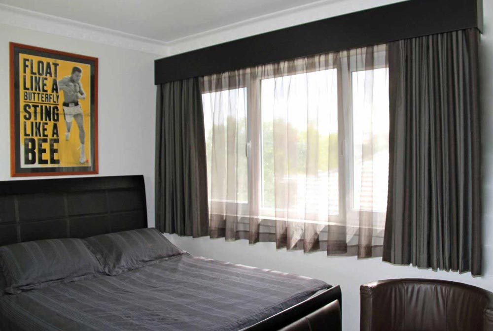 fabrics and things bedroom with black bed and yellow painting fabrics and things bedroom with black bed and yellow painting
