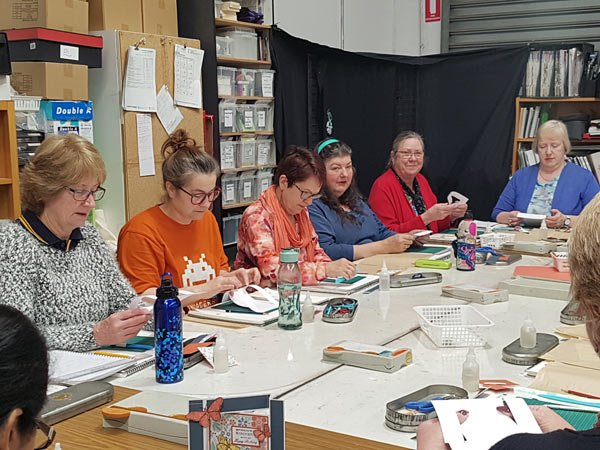 ladies working on crafts