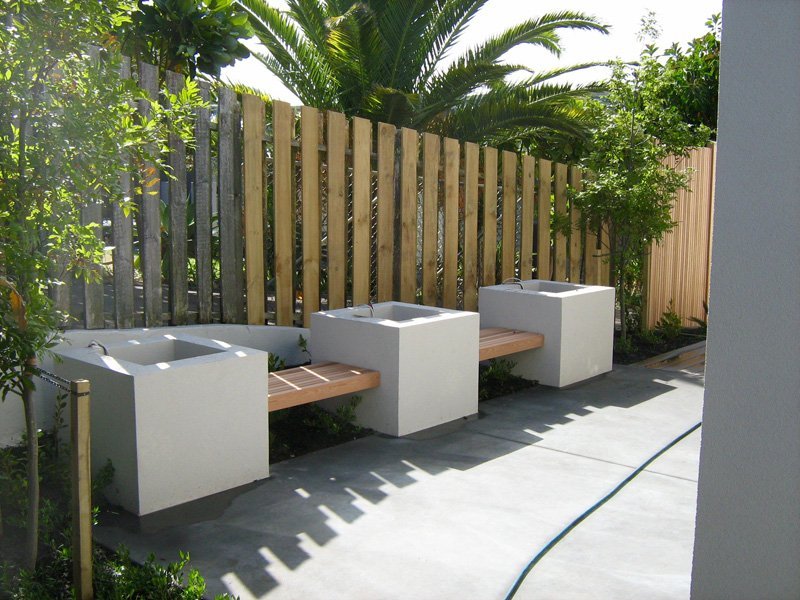 Installed wooden fence by professional in the garden 