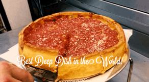 A deep dish pizza with a slice taken out of it