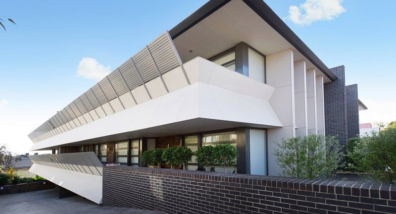 office building with diagonal balcony railings