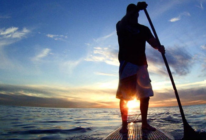 guy in shadow rowing