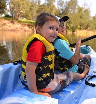 two boy in kayak
