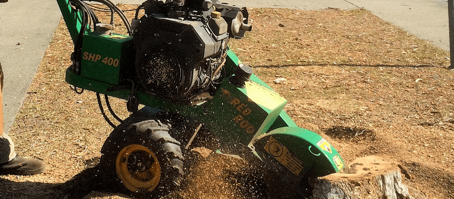 Equipment for stump grinding on its action after the storm striked Gold Coast