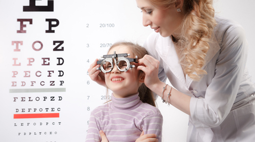 Kid during eye examination