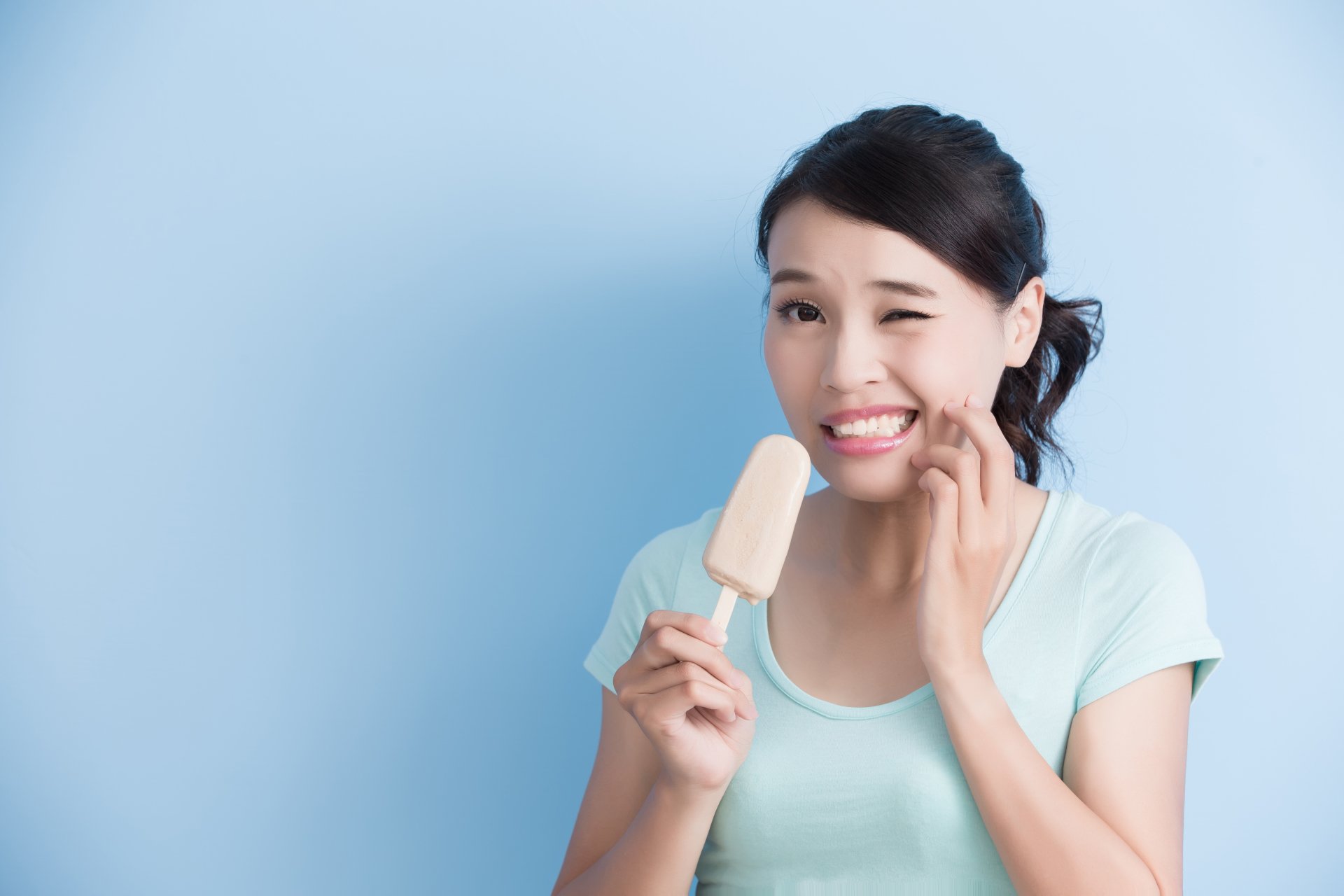 Woman with sensitive teeth - Duxton Dental Christchurch
