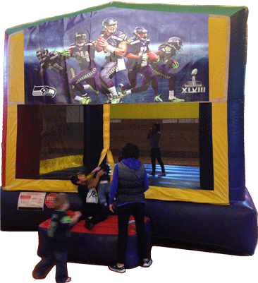 A bouncy house with a picture of the seahawks on it