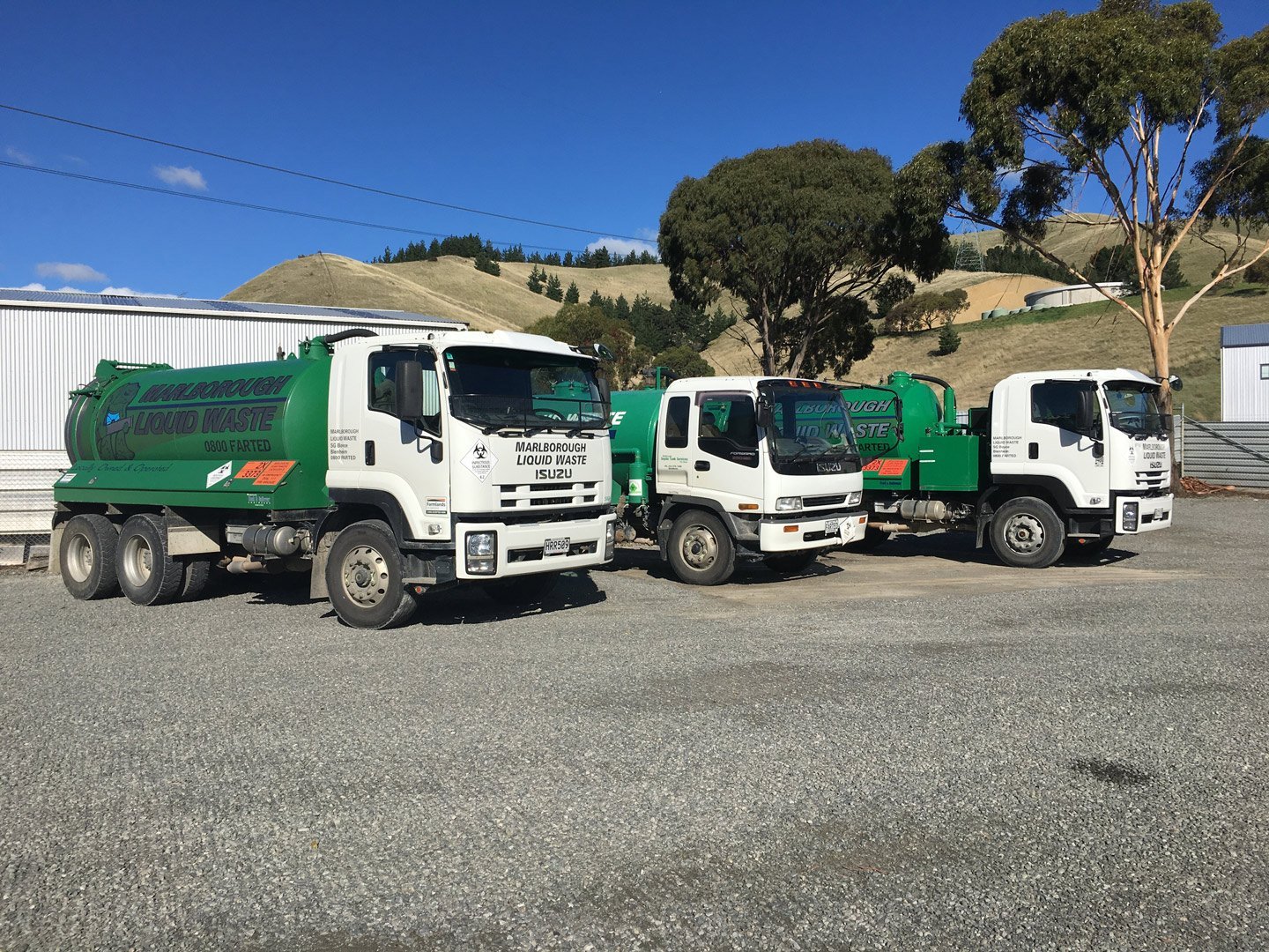 Parked liquid waste removal truck